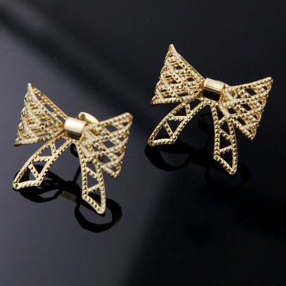 1 Pair Sweet Simple Style Solid Color Bow Knot Plating Hollow Out Copper 18K Gold Plated White Gold Plated Ear Studs