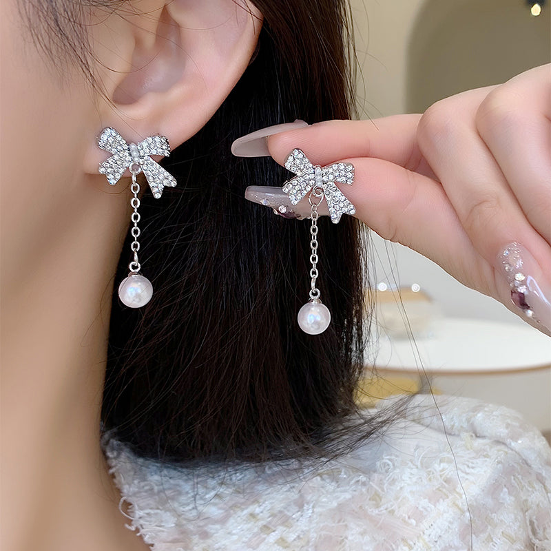 1 Pair Elegant Romantic Bow Knot Plating Inlay Alloy Artificial Rhinestones Artificial Pearls White Gold Plated Drop Earrings