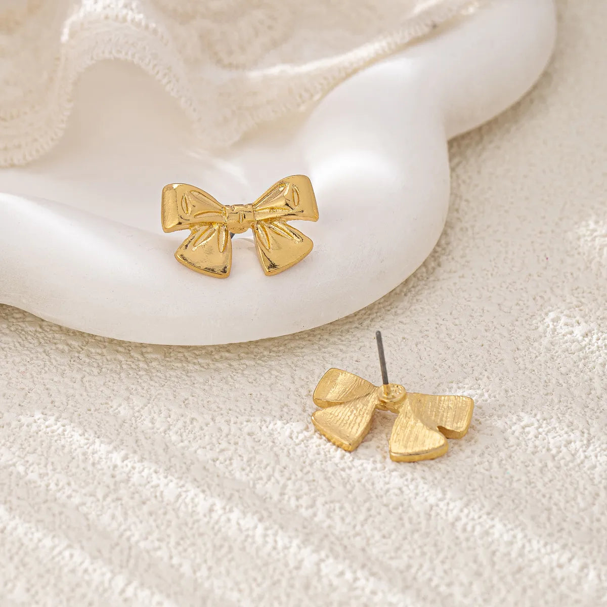 2 Pieces Romantic Shiny Bow Knot Plating Alloy 14K Gold Plated Ear Studs