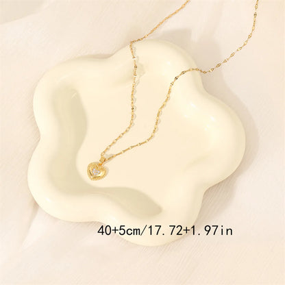 201 Stainless Steel Brass 18K Gold Plated Simple Style Classic Style Plating Inlay Star Heart Shape Bow Knot Zircon Pendant Necklace