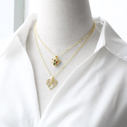 201 Stainless Steel Copper 18K Gold Plated Inlay Heart Shape Bow Knot Zircon Pendant Necklace