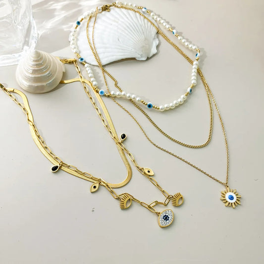 304 Stainless Steel Gold Plated Vacation Tropical Sweet Layered Pearl Inlay Sun Devil'S Eye Zircon Layered Necklaces