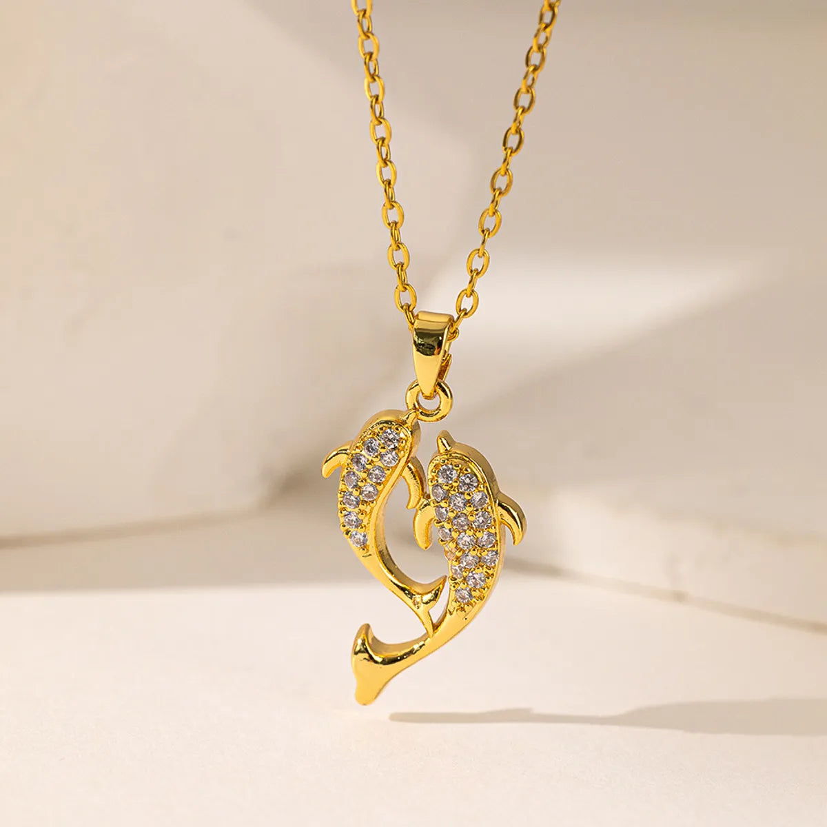 304 Stainless Steel 18K Gold Plated Elegant Artistic Commute Polishing Inlay Moon Dolphin Bow Knot Acrylic Artificial Rhinestones Pendant Necklace