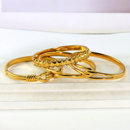 IG Style Elegant Classic Style Stripe Waves Knot 316L Stainless Steel  18K Gold Plated No Inlay Bangle In Bulk