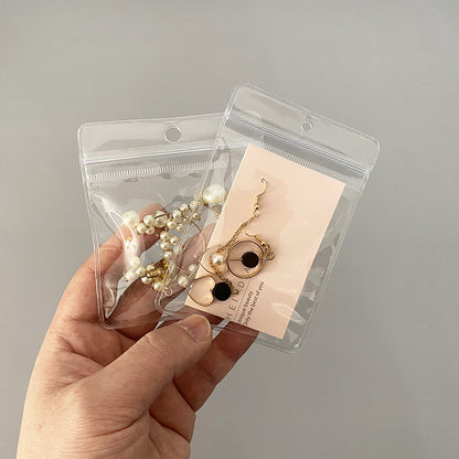 Earrings bag punched display can be hung, household storage necklace, stud earrings, earrings storage, portable transparent jewelry bag