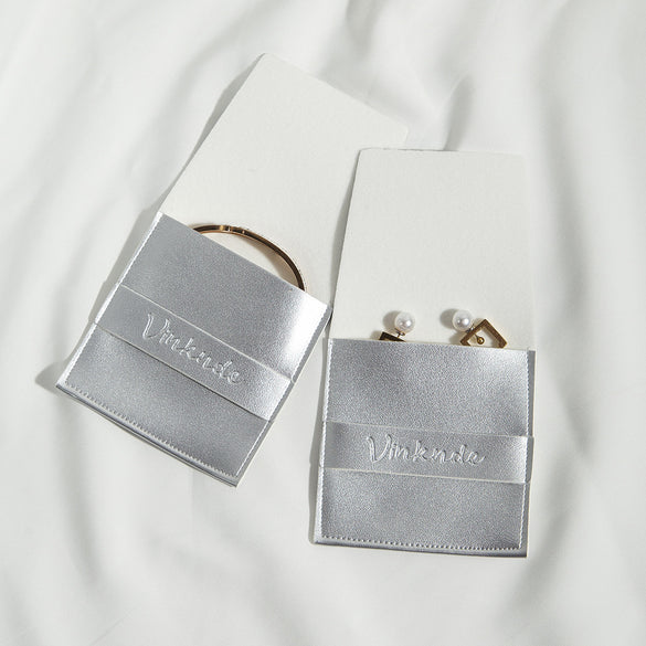 Flip gift imitation leather PU jewelry packaging bag snap bag necklace ring storage bag directly from the manufacturer