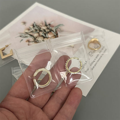 One EVA anti-oxidation pure white transparent jewelry bag in stock, bracelet, earrings, necklace, ring jewelry storage bag.