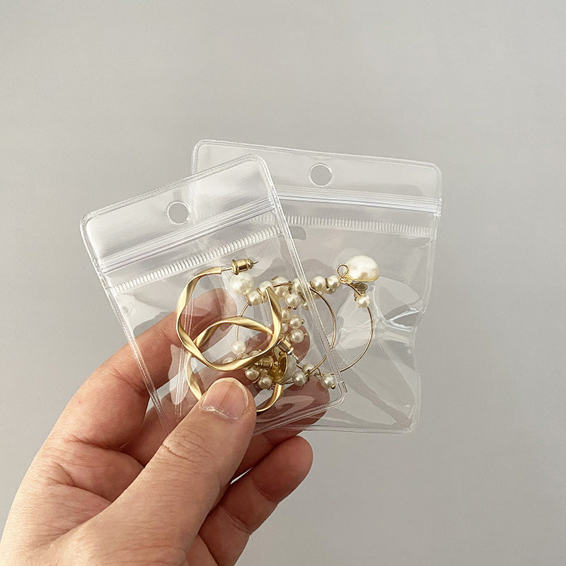 Earrings bag punched display can be hung, household storage necklace, stud earrings, earrings storage, portable transparent jewelry bag