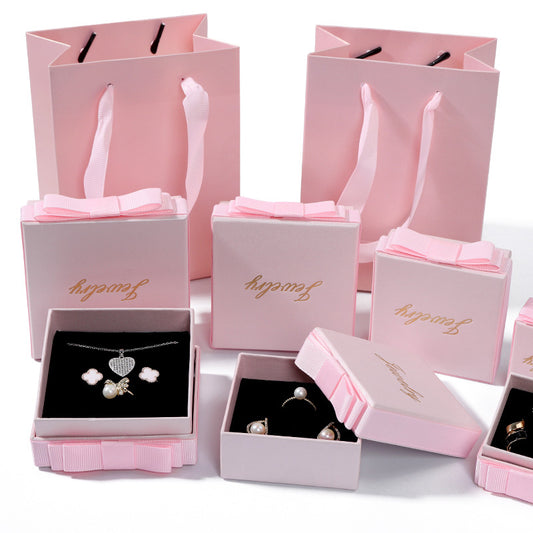 Manufacturer spot wholesale high-end pink jewelry packaging box bow jewelry box gift box carton can be used as logo