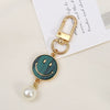 Allmatch Alloy Keychain Pendant With Oil Dropping Flower And Smiley Patterns Semimanual Design