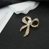 Alloy Bow Hollow Pearl Diamond Brooch Electroplated Lovely Style For Female And Unisex