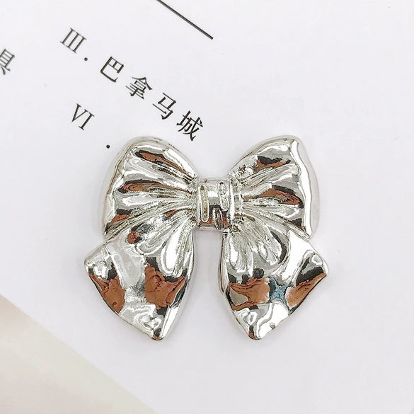 Alloy Bow Mobile Phone Shell And Garment Accessories Electroplated