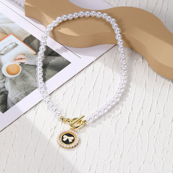 Alloy Bow Necklace With Geometric And Flower Patterns Electroplated