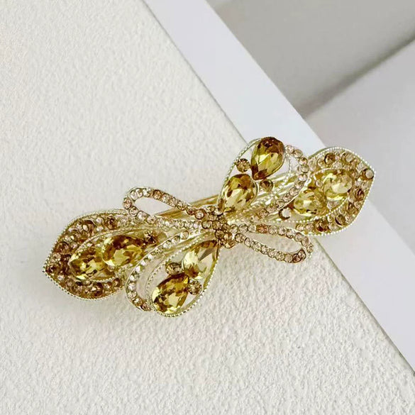 Alloy Crystal Spring Hairpin For Women With Bow Design And Electroplating Processing