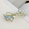 Alloy Crystal Spring Hairpin For Women With Bow Design And Electroplating Processing