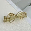 Alloy Crystal Spring Hairpin For Women With Bow Design And Electroplating Processing