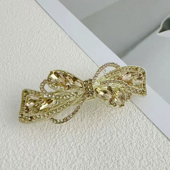 Alloy Crystal Spring Hairpin For Women With Bow Design And Electroplating Processing