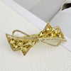 Alloy Crystal Spring Hairpin For Women With Bow Design And Electroplating Processing