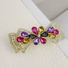 Alloy Crystal Spring Hairpin For Women With Bow Design And Electroplating Processing