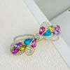 Alloy Crystal Spring Hairpin For Women With Bow Design And Electroplating Processing