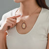 Alloy Electroplated Geometric Oval Pendant Necklace For Women With Inlaid Zircon And Character Statue