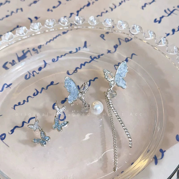 Alloy Electroplated Insect Pattern Women's Ear Jewelry With Asymmetric Blue Butterfly Tassel And Long Pearl Design