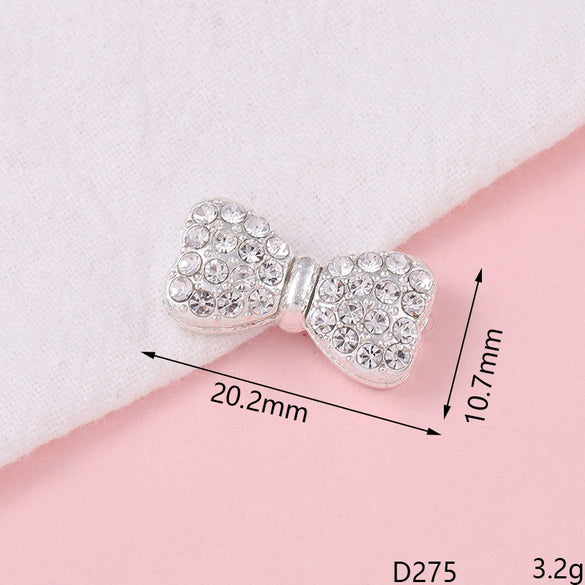 Alloy Fashion Bow Style Painted Mobile Phone Case Jewelry Accessories With Electroplating