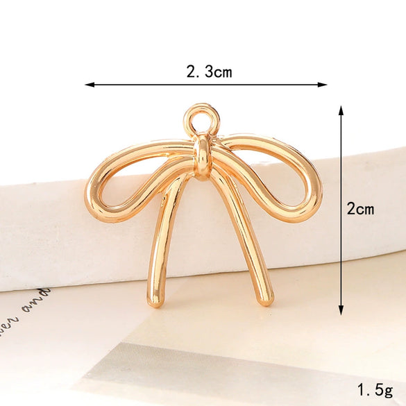 Alloy Fashion Bow Style Painted Mobile Phone Case Jewelry Accessories With Electroplating