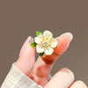 Alloy Gardenia Flower Brooch For Women With Electroplating Traceless Pins And Antirunning Buckle