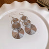 Alloy Geometric Round Mosquito Coil Interlocking Ear Hooks Light Luxury Style Earrings For Women
