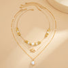 Alloy Imitation Pearl Beaded Niche Style Animal And Geometric Pattern Electroplated Starfish Clavicle Necklace For Women