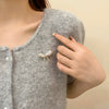 Alloy Irregular Pearl Bow Brooch With Leaf Pattern And Electroplating For Women