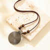 Alloy Leather Cowhide Rope Jewelry Retro Round Pendant Necklace With Geometric Pattern And Electroplating Treatment