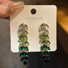 Alloy Light Luxury Leaf Tassel Earrings With Electroplating Process