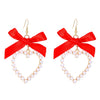 Alloy Pearl Inlaid Heart Shape And Bow Tie Earrings For Women