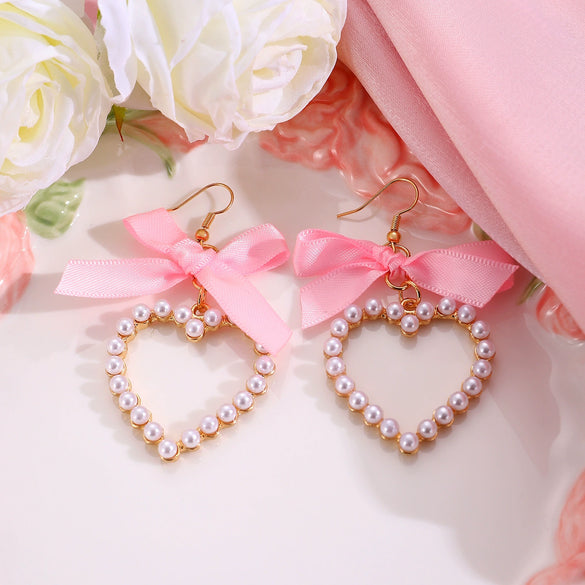 Alloy Pearl Inlaid Heart Shape And Bow Tie Earrings For Women