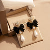 Alloy Retro Red Flocking Bow Pearl Earrings With Electroplating For Women