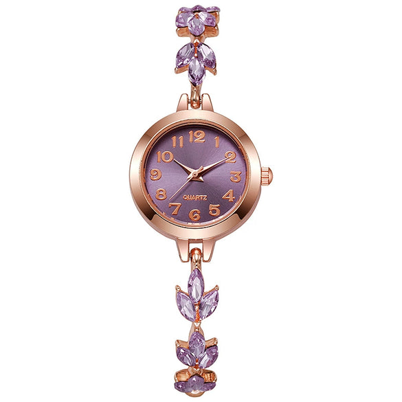 Alloy Women's Fashionable Round Dial Clover Bracelet Watch