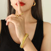 Antique Style Wide And Narrow Elastic Female Bracelet In Titanium Steel With 18K Gold Plated Electroplating