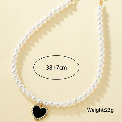 Baroque Style Heart Shape Artificial Pearl Alloy Enamel Inlay Artificial Rhinestones Women's Pendant Necklace