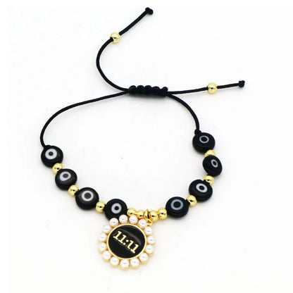 Basic Modern Style Classic Style Devil'S Eye Number Artificial Pearls Resin Rope Copper Wholesale Drawstring Bracelets