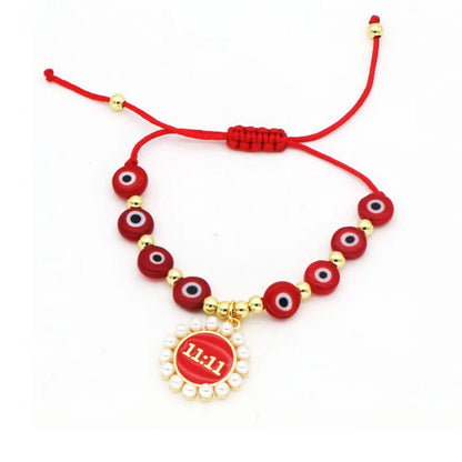 Basic Modern Style Classic Style Devil'S Eye Number Artificial Pearls Resin Rope Copper Wholesale Drawstring Bracelets