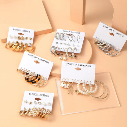 Basic Simple Style Heart Shape Spiral Stripe Leopard Arylic Imitation Pearl Alloy Inlay Rhinestones Women'S Earrings