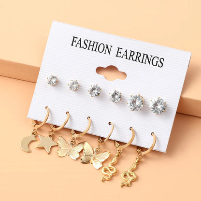 Basic Simple Style Heart Shape Spiral Stripe Leopard Arylic Imitation Pearl Alloy Inlay Rhinestones Women'S Earrings