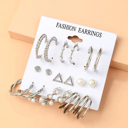 Basic Simple Style Heart Shape Spiral Stripe Leopard Arylic Imitation Pearl Alloy Inlay Rhinestones Women'S Earrings