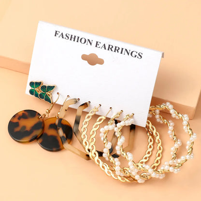 Basic Simple Style Heart Shape Spiral Stripe Leopard Arylic Imitation Pearl Alloy Inlay Rhinestones Women'S Earrings