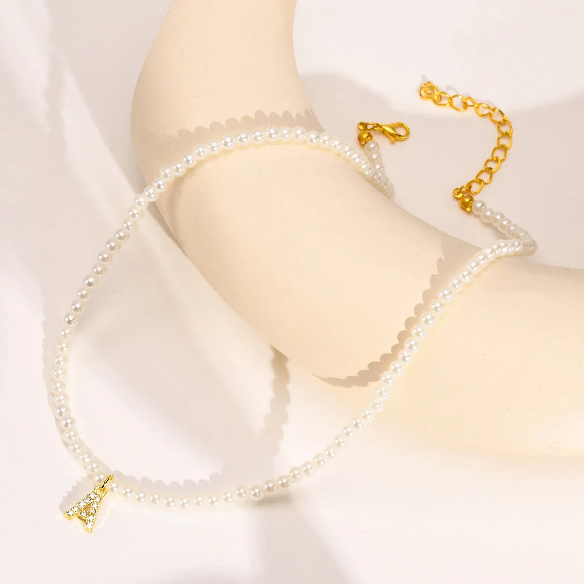 Basic Simple Style Letter Gold Plated Zircon Imitation Pearl Wholesale Pendant Necklace