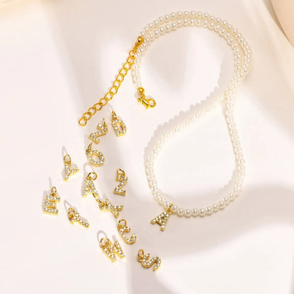 Basic Simple Style Letter Gold Plated Zircon Imitation Pearl Wholesale Pendant Necklace