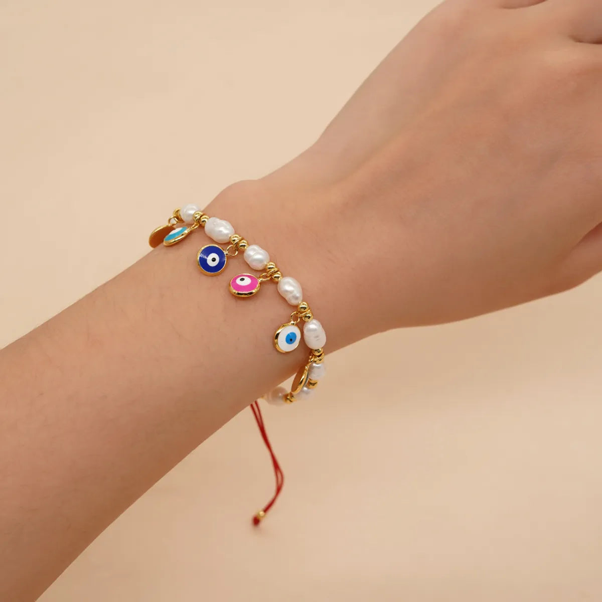 Bohemian Devil's Eye Flower Imitation Pearl Alloy Wholesale Bracelets