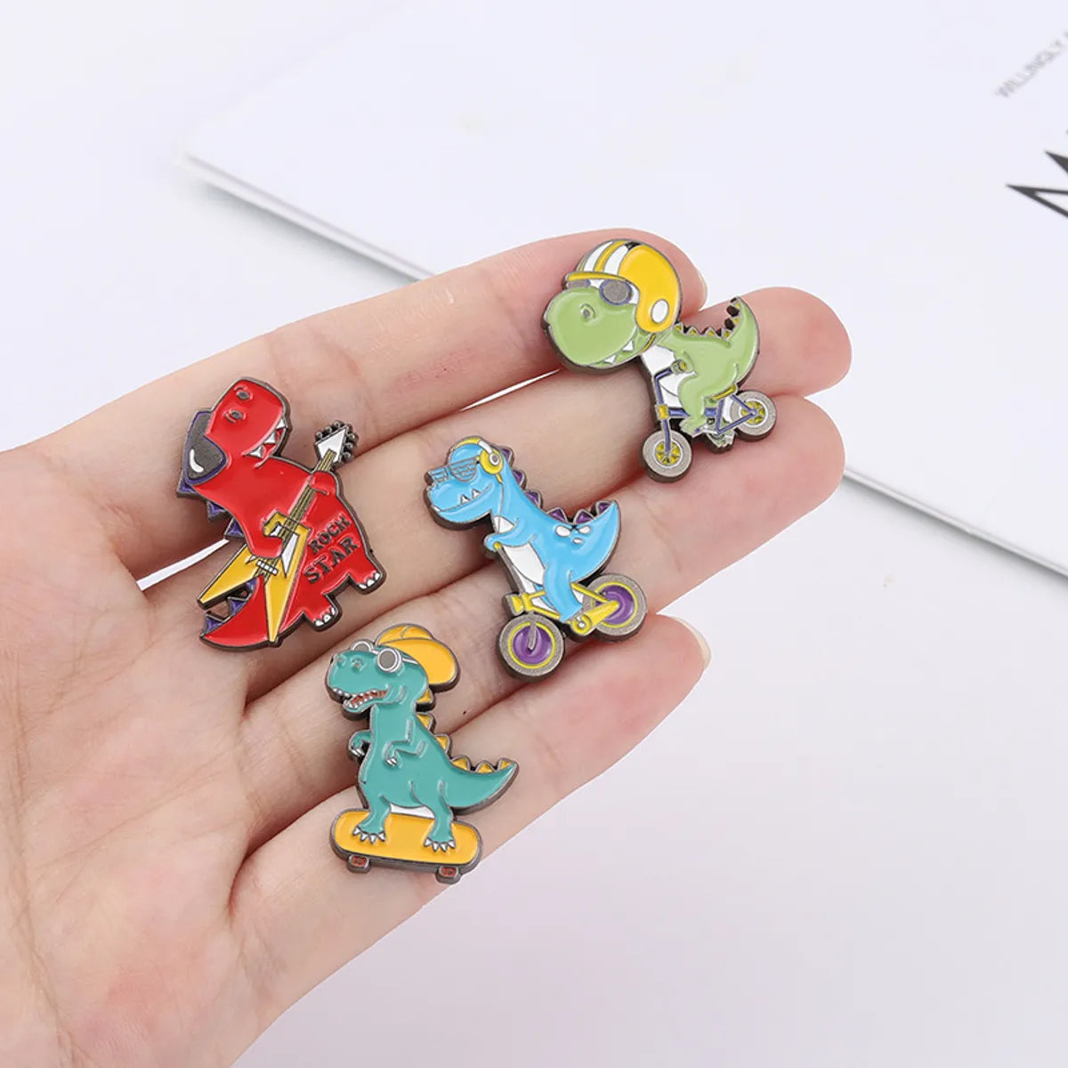 Cartoon Style Cute Cowboy Style Guitar Dinosaur Bicycle Alloy Stamping Stoving Varnish Plating Unisex Brooches